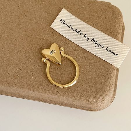 Brass Jewelry Wholesale Adjustable Rings Women Minimalist Jewelry Heart Letter Ring - A collection of gold and silver plated brass rings with heart-shaped designs, engraved with 'YES' and 'NO', displayed on a neutral background.