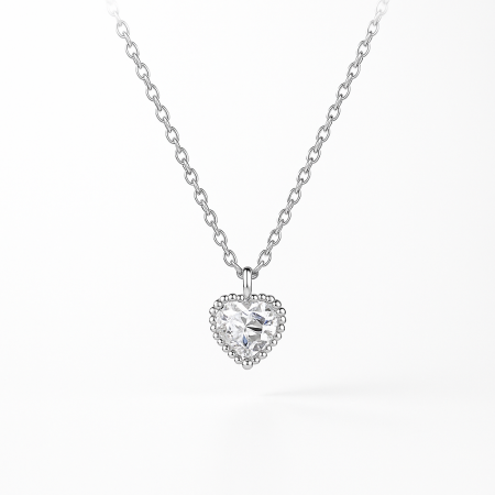 Delicate sterling silver heart-shaped pendant necklace with sparkling crystals.