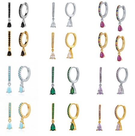 Boucles d'oreilles Everyday Hoop - Une collection de boucles d'oreilles Everyday Hoop de JR Fashion Accessories, présentant divers finitions métalliques et des pendentifs en pierres précieuses colorées.