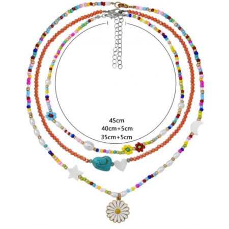 Detailed view of the layered beaded necklace showing the adjustable lobster clasp.