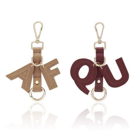 Customizable leather initial keychains, perfect for personalized gifts.