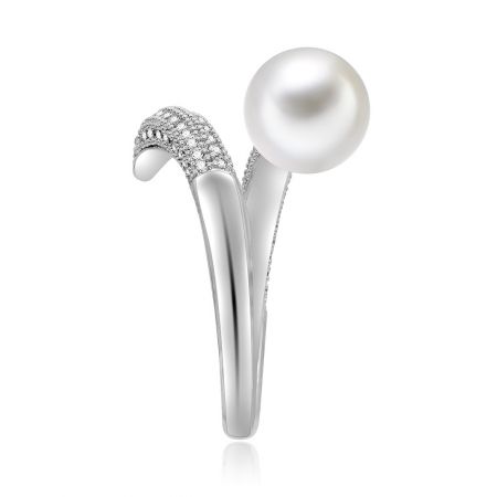 A close-up lifestyle shot highlighting the luxurious appeal of the pearl and cubic zirconia ring.
