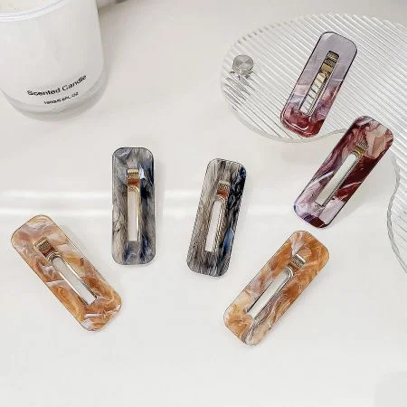 Acrylic Geometric Square Hollow Hair Clips (Set of 5) - A collection of five acrylic hair clips in various marbled colors, featuring a geometric square hollow design, displayed neatly for a product showcase.