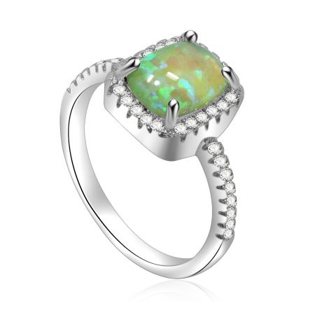 Side view of the Green Opal Burst White Ring, highlighting the intricate rhodium-plated band and the setting of the green opal.