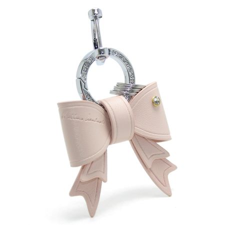 Delicato portachiavi a fiocco in PU rosa pallido con un elegante dettaglio di strass.