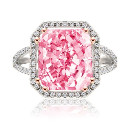 Anillo ¿Quieres ser mío? - Un impresionante primer plano del anillo '¿Quieres ser mío?', con un gran centro de circonita cúbica rosa rodeado por un halo de piedras blancas más pequeñas en una banda bicolor de rodio y oro rosa.