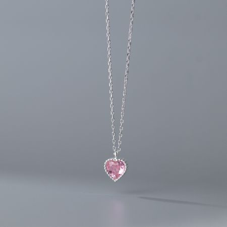 Detailed view of the pink heart gemstone pendant necklace.