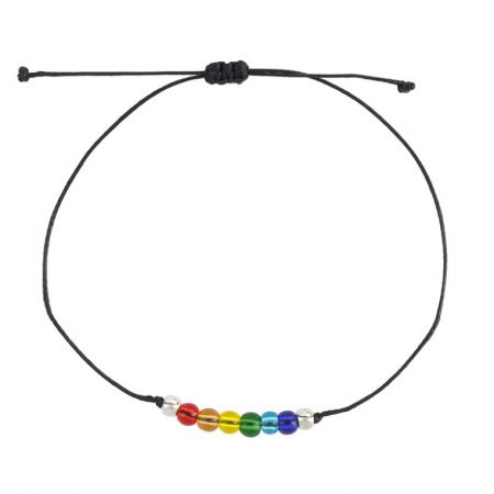 Detailed view of the rainbow bead bracelet on its black cord, showing the adjustable sliding knot closure.