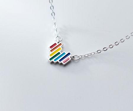 The complete 925 Sterling Silver Rainbow Heart Necklace laid out, displaying the full chain and pendant.