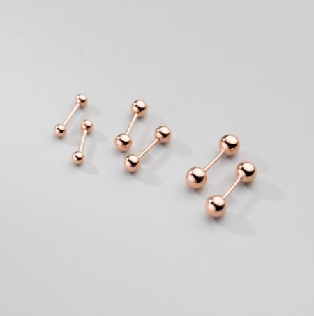 Orecchini a perno a doppia sfera in argento sterling 925 placcati in oro rosa.