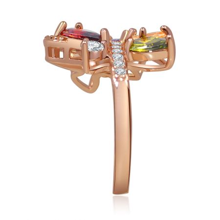 Side profile of the rose gold ring highlighting the setting of the red, white, and yellow-green stones.