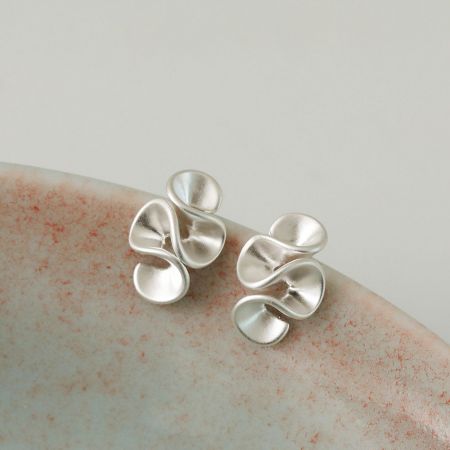 Brass Wave Geometric Matte Silver Earrings - A pair of brass wave geometric earrings with a matte silver finish, displayed on a light background.