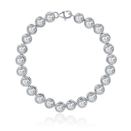 Pulsera de tenis de 5MM con circonio cúbico engastado en bisel. - Una impresionante pulsera de tenis de 5MM con circonio cúbico engastado en bisel, mostrando sus brillantes y claros gemas y un acabado de rodio de alta calidad sobre un fondo blanco.