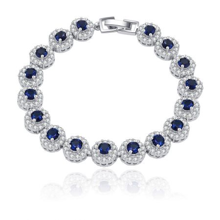 Sapphire elegance bracelet in silver with blue and clear gemstones.