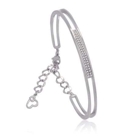 A styled shot of the Halo Pave Set Bangle, showing its full length and brilliant cubic zirconia stones.