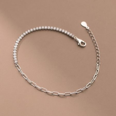 Detailed shot of the 925 sterling silver zircon link chain bracelet, highlighting the mixed chain design.