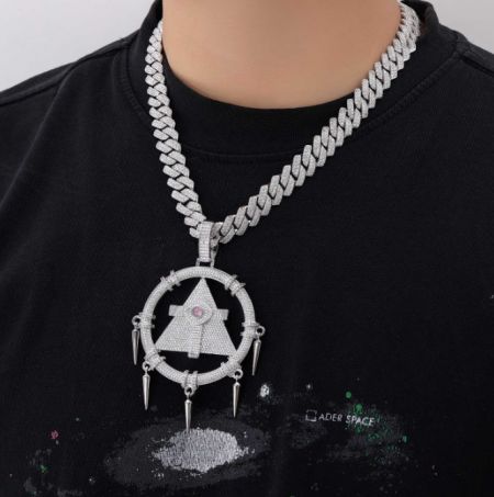 The Millennium Wheel Wisdom Necklace shown in a sleek sterling silver finish, highlighting its unique triangular pendant design.