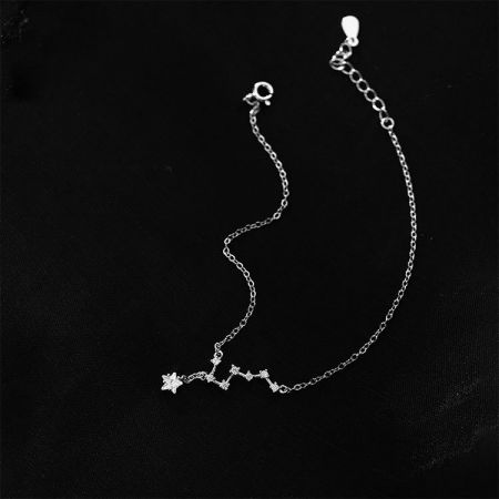 Full view of the celestial-themed constellation bracelet, highlighting its multiple zircon charms.
