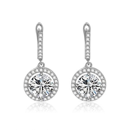 Clear CZ Halo Round Drop Earrings - A close-up of the Clear CZ Halo Round Drop Earrings, showcasing the silver circular pendant with a large central cubic zirconia surrounded by a halo of smaller stones.