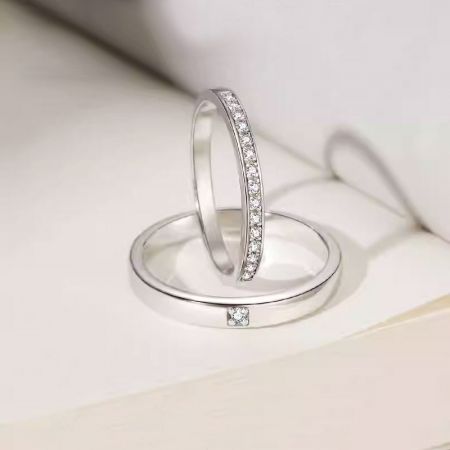 Detailed studio shot of the cubic zirconia couples ring set.