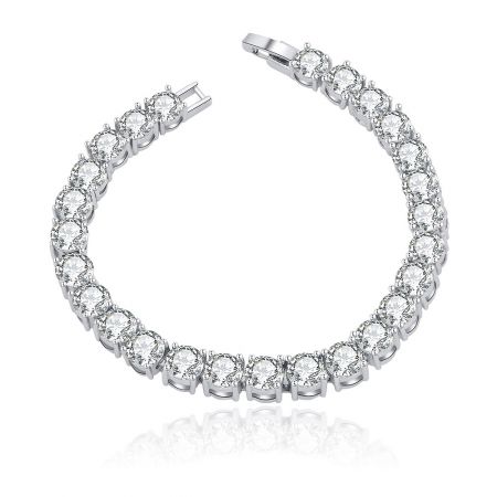 Tennis Wrist Candy Bracelet - A stunning Tennis Wrist Candy Bracelet featuring a continuous line of brilliant round cubic zirconia stones set in a rhodium-plated brass band, showcasing its elegant design and sparkle.