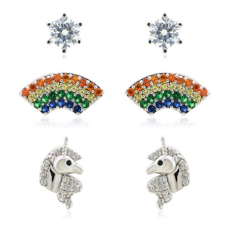 Star Unicorn And Rainbow Set Earrings - A set of three whimsical stud earrings: a silver unicorn, a colorful rainbow with cubic zirconia, and a single square CZ stone, displayed on a white background.