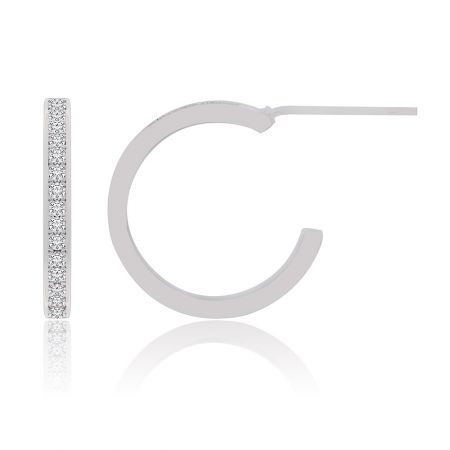 A stylistic shot showing the versatile CZ hoop earring, perfect for mixing and matching.