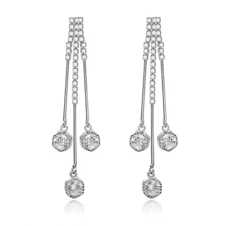 Triple Clear Round Long Drop Earrings - Front view of the Triple Clear Round Long Drop Earrings, showcasing the rhodium-plated brass and three sparkling white cubic zirconia stones.