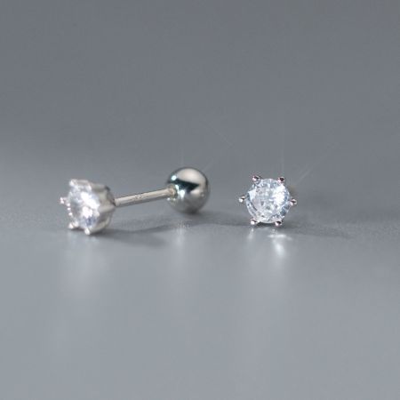 A pair of classic 925 sterling silver stud earrings with sparkling clear cubic zirconia.