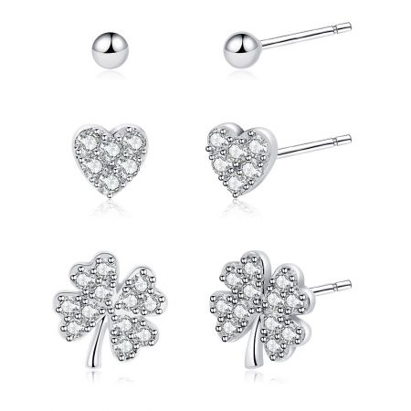 Close-up of the heart and clover leaf stud earrings showcasing the clear cubic zirconia stones.