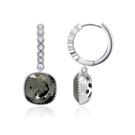 Side view of the S925 huggie hoop earrings, highlighting the silver setting and the dark square gemstone.