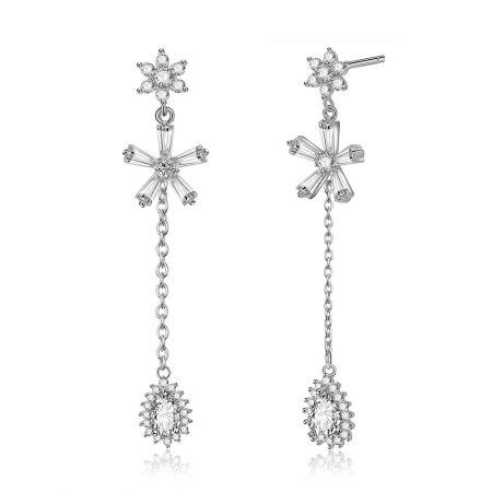 Close-up shot of the chandelier earrings, highlighting the floral starburst pattern and the exceptional clarity of the AAA-grade stones.