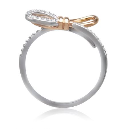 Angled shot of the Tied Ribbon Bow Ring, displaying the small diamonds on the bow and the two-tone band.