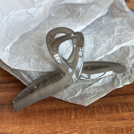 Grey acetate hair jaw clip with French design.