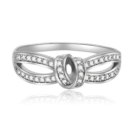 Bow Knot Ring with Cubic Zirconia - Bow Knot Ring with an intertwined design, made from rhodium-plated brass and accented with cubic zirconia stones.