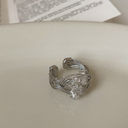 A second design of the silver crystal wire-wrapped ring, showcasing a delicate and abstract pattern.