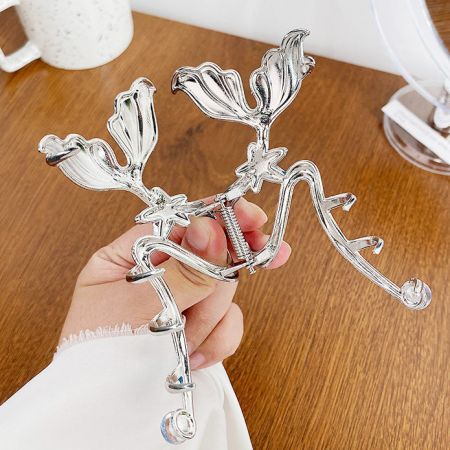 The back of the hair clip, showing the durable silver metal clasp mechanism.