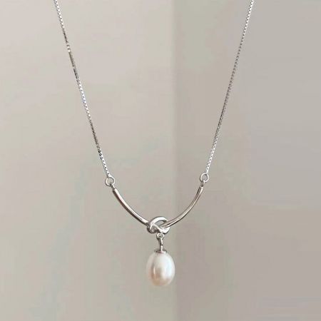 Silver Plated Knot-Drop Pearl Pendant Necklaces - A close-up of an elegant silver-plated knot-drop pearl pendant necklace, displayed on a neutral background.