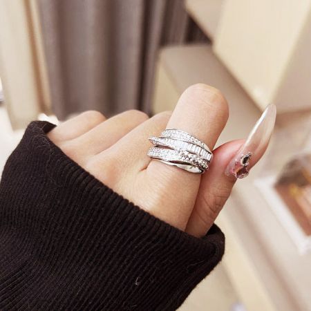 Adjustable Open Silver Multi-Layered Cubic Zircon Brass Rings - A model's hand showcasing the adjustable open multi-layered cubic zirconia brass rings, highlighting their elegant design and fit.