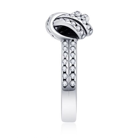 Detailed side view of the Sparkling Love Knot Ring, emphasizing its curved top and the meticulous setting of the cubic zirconia stones along the band.