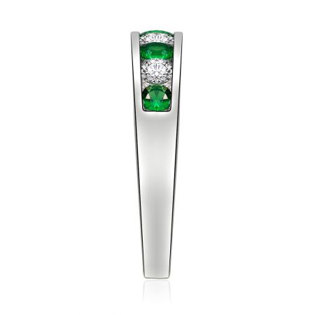 Close-up detail of the Emerald and White Band Ring, highlighting the fine craftsmanship and secure stone setting.
