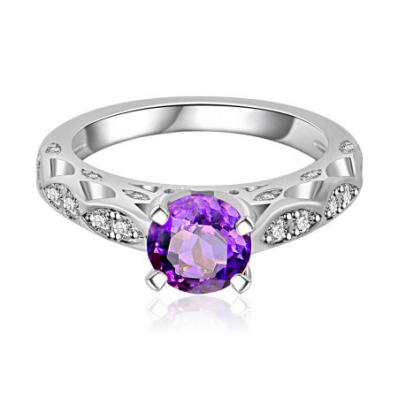 Amethyst Roman Edge Ring - Amethyst Roman Edge Ring featuring a central purple cubic zirconia surrounded by clear gemstones on an ornate, rhodium-plated brass band.