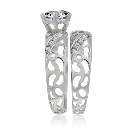 The complete Timeless Ring Set, showing both the main engagement-style ring and the matching band together.
