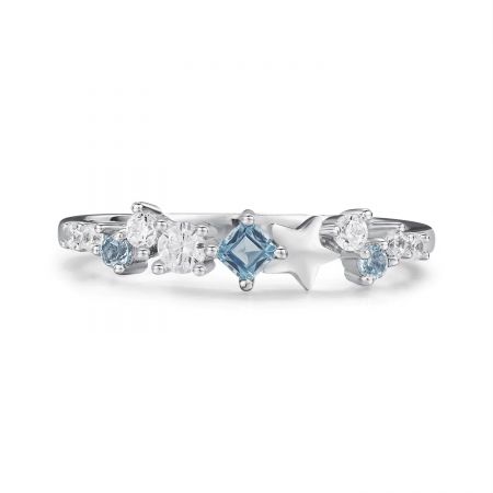 Stellar Dreams : Bague étoile en argent 925 avec zircons bleus et blancs - Bague étoile en argent sterling 925 Stellar Dreams avec des zircons bleus et blancs brillants.