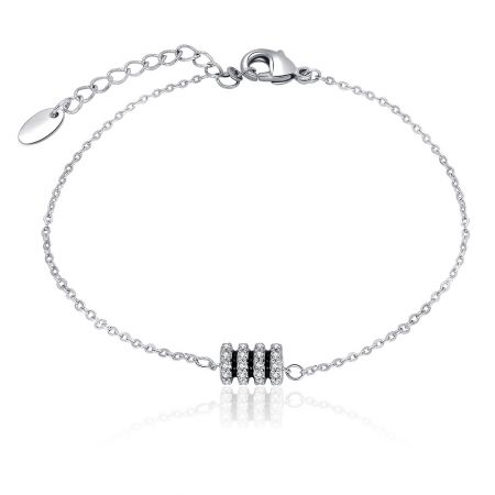 Round Bijoux Charm Bracelet - Close-up of the Round Bijoux Charm Bracelet, showcasing its silver-toned brass construction, rhodium plating, and sparkling cubic zirconia charm details.