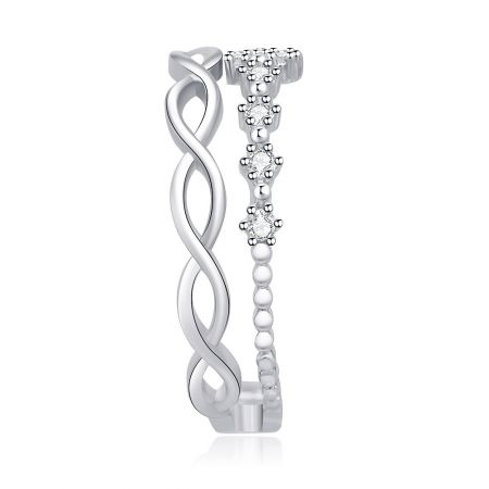 Angled shot of the Braided Weave Star CZ Ring, emphasizing the polished rhodium plating and intricate weave design.