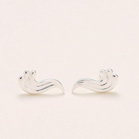 A pair of sterling silver stud earrings featuring a unique, abstract wavy design.