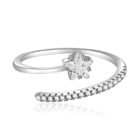 Stackable Solitaire Princess-Cut Star Ring - A close-up view of the Stackable Solitaire Princess-Cut Star Ring, showcasing its unique star-shaped cubic zirconia centerpiece and the delicate rhodium-plated brass band.