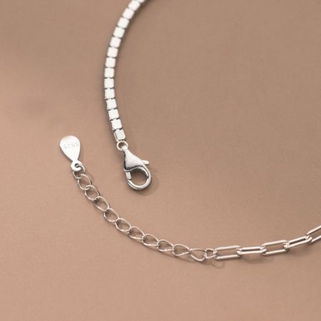 The S925 sterling silver quality stamp on the bracelet's clasp.