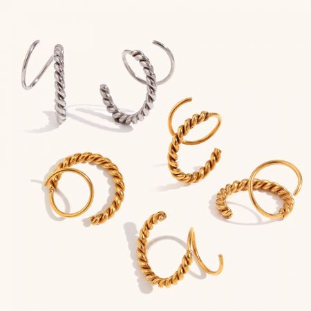 Various styles of the stainless steel spiral twist earrings displayed in silver and gold plating.